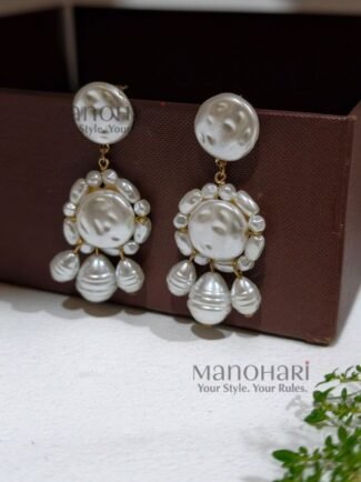Ruhani floral pearl drop earrings featuring elegant floral detailing and baroque pearl charms