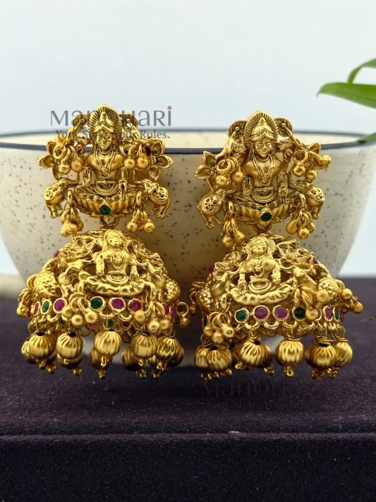 **Shri Lakshmi Temple Earrings crafted from premium copper, brass, and metal alloy with a high gold polish, featuring an intricate Goddess Lakshmi motif and elegant jhumka design for women.**