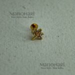 **Nazara AD Gold Nose Ring featuring a sparkling 0.4 cm Cubic Zirconia (American Diamond) stone in a premium gold-plated brass setting for women.**