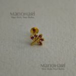 **Nazara AD Gold Nose Ring featuring a sparkling 0.4 cm Cubic Zirconia (American Diamond) stone in a premium gold-plated brass setting for women.**