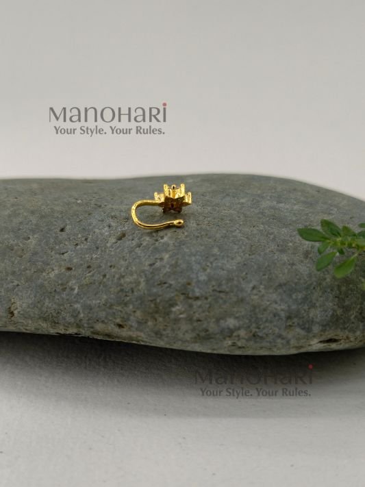 Vasuki Floral Spark Nose Ring featuring sparkling cubic zirconia accents and a delicate floral-inspired design in a non-piercing gold-tone clip-on style