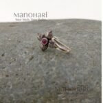 Vasuki Retro Blossom Nose Pin featuring a vintage floral design with a silver replica finish in an adjustable non-piercing style