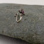 Vasuki Retro Blossom Nose Pin featuring a vintage floral design with a silver replica finish in an adjustable non-piercing style