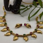 **Anvitha Heritage Necklace Set crafted from premium brass with a high gold polish, featuring a traditional South Indian design and matching earrings for women.**