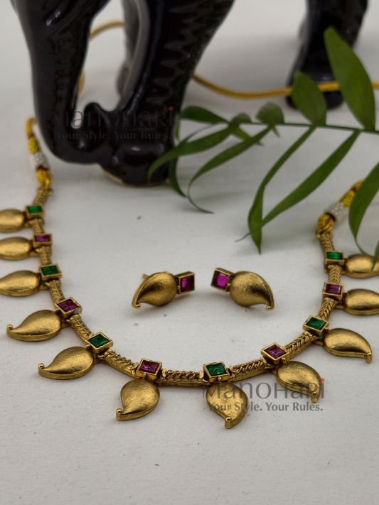 **Anvitha Heritage Necklace Set crafted from premium brass with a high gold polish, featuring a traditional South Indian design and matching earrings for women.**