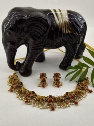 **Royal Grace Necklace Set crafted from premium brass with a high gold polish, featuring an elegant heritage-inspired design and matching earrings for women.**