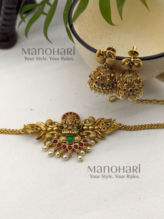 **Vaidehi Temple Heritage Necklace Set crafted from premium brass with a high gold polish, featuring a traditional South Indian temple design with matching earrings for women.**