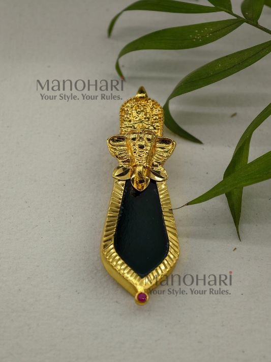 **Elephant Heritage Palakka Pendant featuring a Vinayagar-inspired elephant head, traditional Kerala Palakka, Nagapadam, and Mango motifs with intricate gold detailing.**