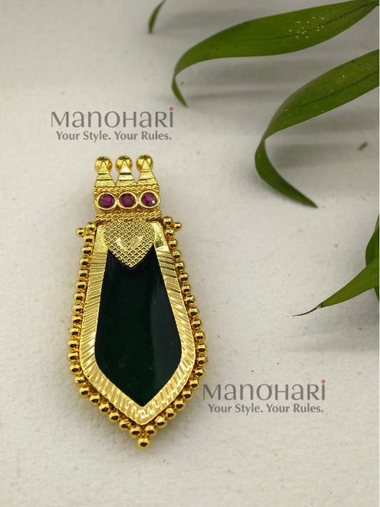 **Kairali Heritage Palakka Pendant crafted with a premium gold-plated finish, featuring a traditional green Kerala Palakka design for women.**