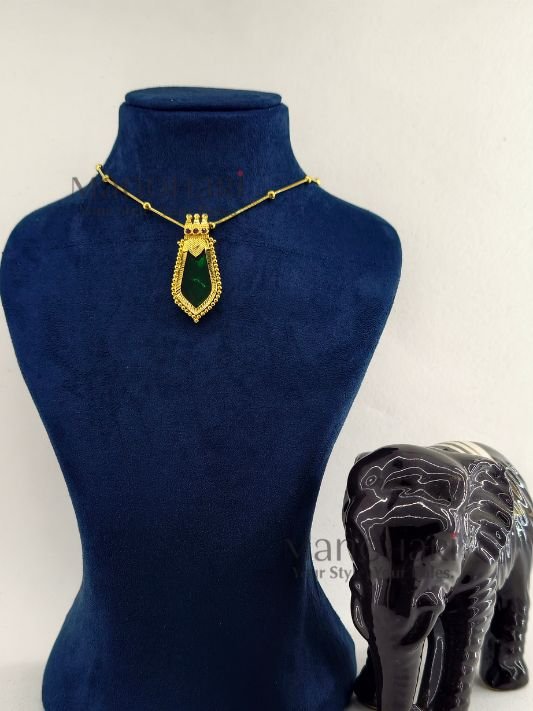 **Kairali Heritage Palakka Pendant crafted with a premium gold-plated finish, featuring a traditional green Kerala Palakka design for women.**