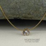 **Elara Luxe Stone Pendant with a delicate 0.5 cm stone, premium gold-plated anti-tarnish finish, and adjustable chain for women.**