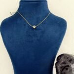 **Elara Luxe Stone Pendant with a delicate 0.5 cm stone, premium gold-plated anti-tarnish finish, and adjustable chain for women.**