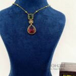 Royal Heritage Pendant Set crafted from premium brass with a matte gold finish, featuring a 5 cm pendant, 21 cm chain, and matching earrings for women.