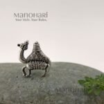 Aarini desert caravan ring with detailed camel motif statement design