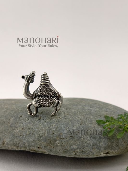 Aarini desert caravan ring with detailed camel motif statement design