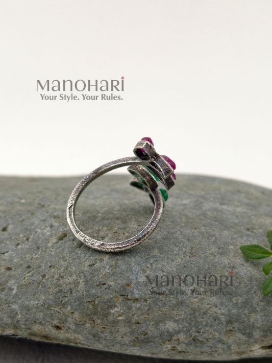 MN-RG-REBR-RUH-01_3 Ruhani emerald bloom ring with vibrant red and green floral stone detailing