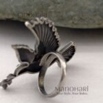 Ruhani peace dove ring with elegant bird inspired statement design
