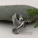 Ruhani peace dove ring with elegant bird inspired statement design