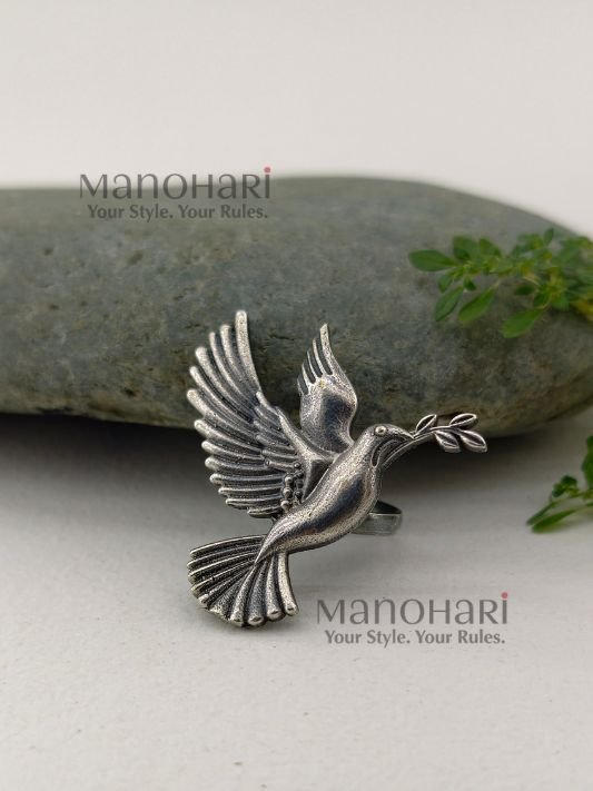 Ruhani peace dove ring with elegant bird inspired statement design