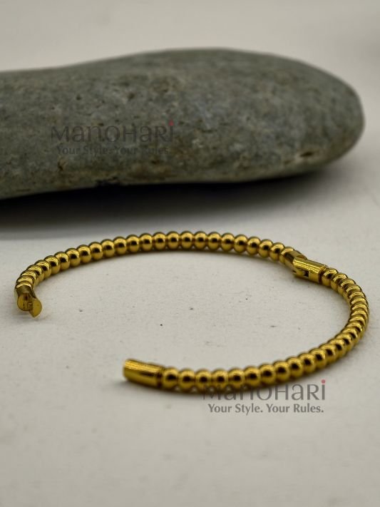 MN-BR-KDA-ADK-01_3 **Aarunya Divine Kada Bracelet crafted from premium 316L stainless steel with luxurious 18K gold plating, featuring an anti-tarnish, waterproof, and hypoallergenic minimalist design for women.**