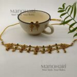 **Aditi Antique Heritage Choker Set crafted from premium brass metal with a luxurious High Gold Polished finish, featuring an elegant antique-inspired choker design adorned with artificial fibre and glass stones for women.**