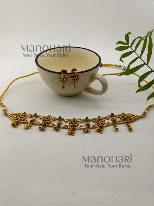 MN-CS-ANT-AAH-01_2 **Aditi Antique Heritage Choker Set crafted from premium brass metal with a luxurious High Gold Polished finish, featuring an elegant antique-inspired choker design adorned with artificial fibre and glass stones for women.**