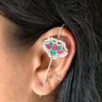 **Padmika Lotus Meenakari Ear Cuff crafted from premium brass with an elegant silver-plated finish, featuring a traditional lotus-inspired Meenakari design for timeless ethnic elegance.**