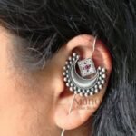 **Noor Moon Grace Ear Cuff crafted from premium brass with an elegant Silver Replica finish, featuring a crescent moon-inspired design for a stylish ethnic and boho look.**