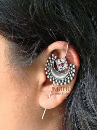 **Noor Moon Grace Ear Cuff crafted from premium brass with an elegant Silver Replica finish, featuring a crescent moon-inspired design for a stylish ethnic and boho look.**