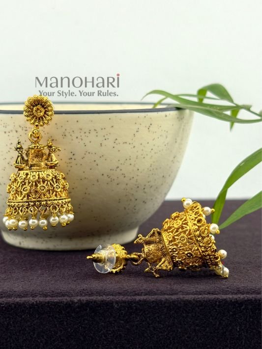 MN-ER-ANT-AAE-01_4 **Aadhira Antique Elegance Earrings crafted from premium brass metal with a radiant High Gold Polished finish, featuring an elegant antique-inspired design adorned with artificial stones for women.**
