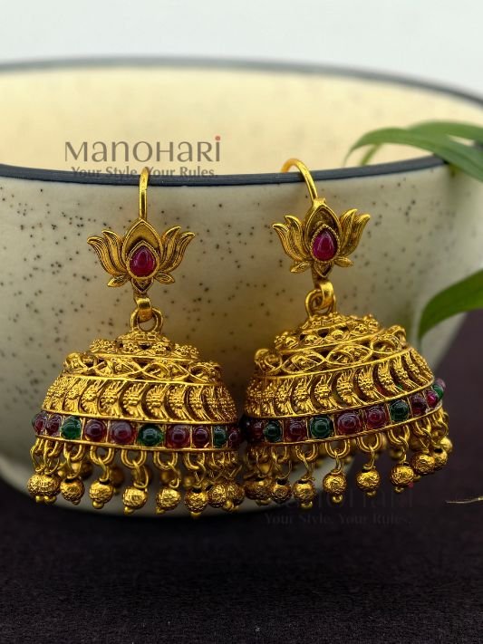 MN-ER-ANT-MAC-02_2 **Rajnidhi Lotus Heritage Jhumka crafted from premium brass with a luxurious Rajwadi polish, featuring an elegant lotus-inspired design adorned with artificial stones for women.**