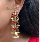 **Rajeshwari Antique Heritage Jhumka crafted from premium copper, brass, and metal alloy with a radiant High Gold Polish, featuring an elegant heritage-inspired long jhumka design adorned with artificial stones for women.**