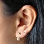 **Liora Double Drop Earrings featuring a premium anti-tarnish gold-plated finish with an elegant double-drop design, lightweight and stylish for everyday wear and special occasions.**