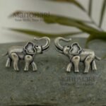 **Gajika Elephant Charm Stud Earrings crafted from premium brass with an elegant silver-plated finish, featuring an intricate elephant motif inspired by Indian heritage for timeless ethnic elegance.**