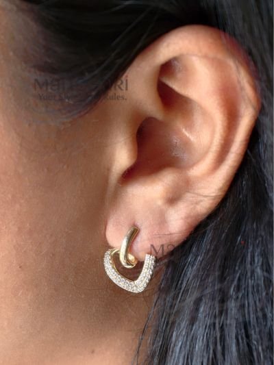 **Elina Heart Charm Earrings crafted from premium copper alloy with luxurious 18K gold plating, featuring an elegant heart-shaped design that is anti-tarnish, waterproof, and hypoallergenic for women.**