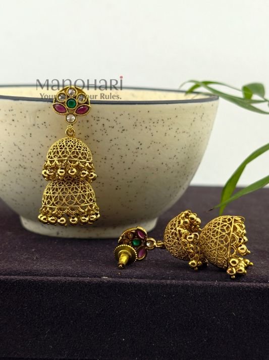Mrunalini Pearl Heritage Jhumka crafted from premium copper and brass metal alloy with a radiant high gold polish, featuring elegant clustered pearls and heritage-inspired jhumka design for women.