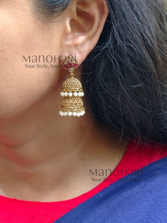 **Mrunalini Pearl Heritage Jhumka crafted from premium copper and brass metal alloy with a radiant high gold polish, featuring elegant clustered pearls and heritage-inspired jhumka design for women.**