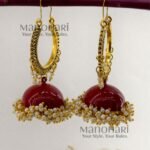 **Aarunya Meenakari Heritage Jhumkas featuring intricate hand-painted Meenakari artwork in a graceful 8.5 cm statement design, crafted to add timeless elegance and vibrant ethnic charm to every occasion.**