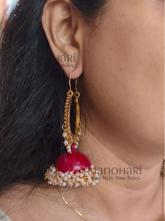 **Aarunya Meenakari Heritage Jhumkas featuring intricate hand-painted Meenakari artwork in a graceful 8.5 cm statement design, crafted to add timeless elegance and vibrant ethnic charm to every occasion.**