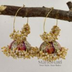 **Mehera Meenakari Pearl Jhumka Hoops featuring intricate hand-painted Meenakari artwork, elegant Mogra-style pearl embellishments, a radiant gold-plated finish, and traditional Bali hoop Jhumka design for timeless ethnic elegance.**