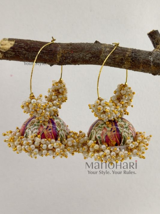 **Mehera Meenakari Pearl Jhumka Hoops featuring intricate hand-painted Meenakari artwork, elegant Mogra-style pearl embellishments, a radiant gold-plated finish, and traditional Bali hoop Jhumka design for timeless ethnic elegance.**