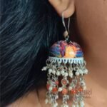 **Rangmaya Meenakari Artisan Jhumkas featuring intricate hand-painted Meenakari artwork, elegant bead embellishments, and a graceful 8 cm statement design, handcrafted for timeless ethnic elegance and festive charm.**