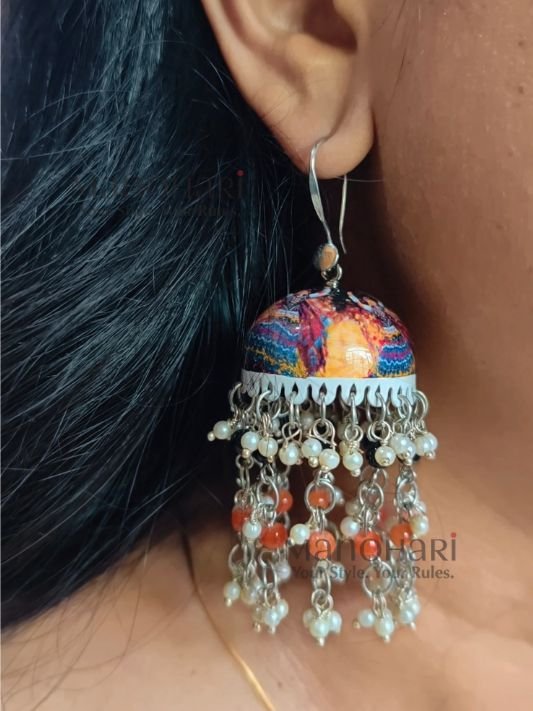 **Rangmaya Meenakari Artisan Jhumkas featuring intricate hand-painted Meenakari artwork, elegant bead embellishments, and a graceful 8 cm statement design, handcrafted for timeless ethnic elegance and festive charm.**