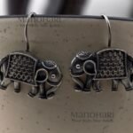 **Niya Nature Charm Earrings crafted from premium brass with a radiant silver-plated finish, featuring elegant animal-shaped drop earrings adorned with artificial stones and decorative beads, secured with fish hook earwires for women.**