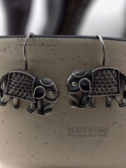 **Niya Nature Charm Earrings crafted from premium brass with a radiant silver-plated finish, featuring elegant animal-shaped drop earrings adorned with artificial stones and decorative beads, secured with fish hook earwires for women.**