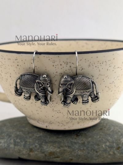 **Niya Nature Charm Earrings crafted from premium brass with a radiant silver-plated finish, featuring elegant animal-shaped drop earrings adorned with artificial stones and decorative beads, secured with fish hook earwires for women.**