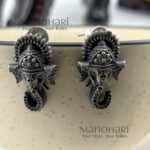 **Nivara Nature Stud Earrings crafted from premium brass with a radiant silver-plated finish, featuring an elegant nature-inspired stud design for lightweight everyday wear.**