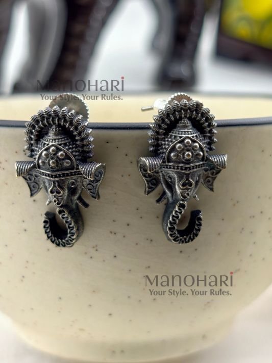 **Nivara Nature Stud Earrings crafted from premium brass with a radiant silver-plated finish, featuring an elegant nature-inspired stud design for lightweight everyday wear.**