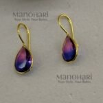Elegant Elara Raindrop Elegance Earrings featuring a sleek raindrop-inspired design crafted from premium alloy for women.