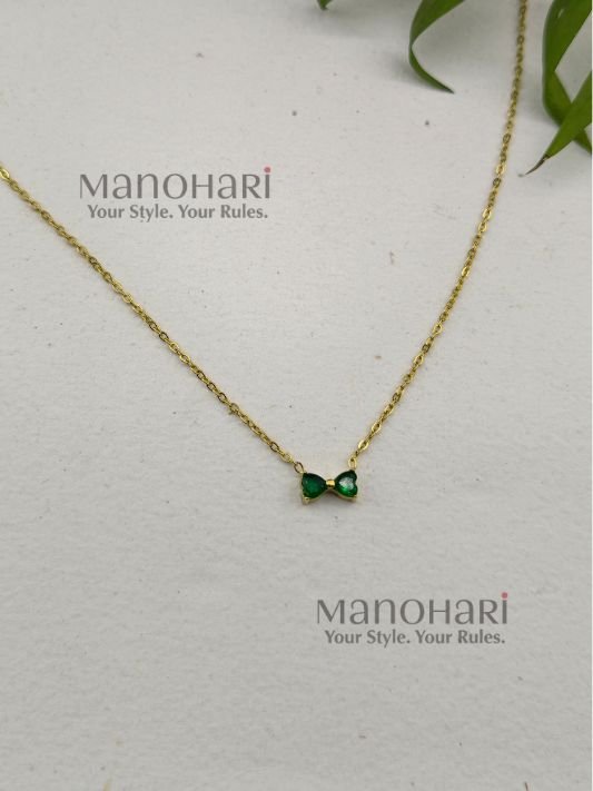 **Elina Bow Elegance Necklace crafted from premium stainless steel with luxurious 18K Gold PVD plating, featuring a delicate minimalist bow pendant that is waterproof, anti-tarnish, and skin-safe for women.**